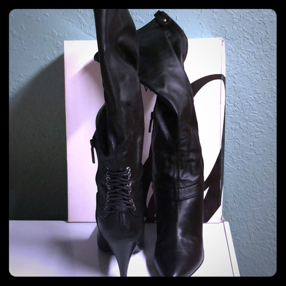 Knee high black boots with lace up detail